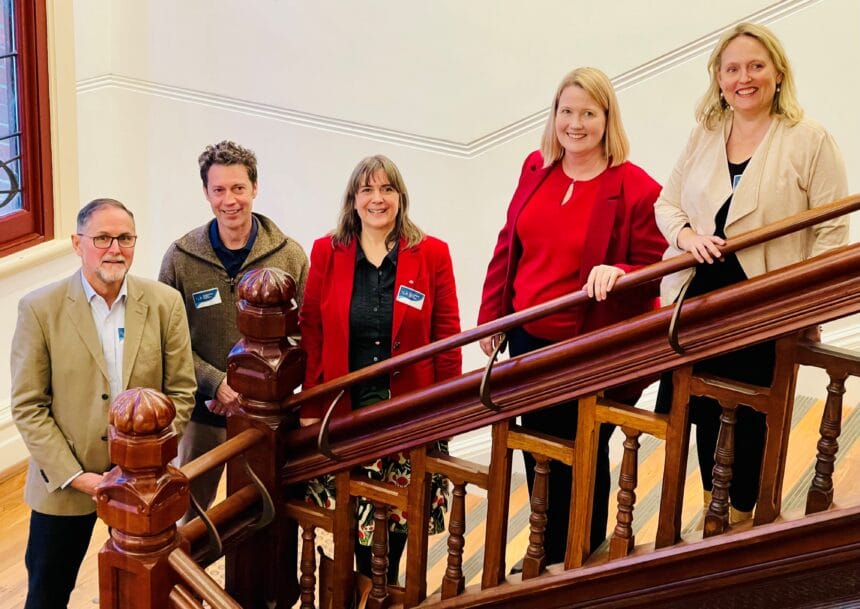 PSHB Research Symposium panellists on staircase
